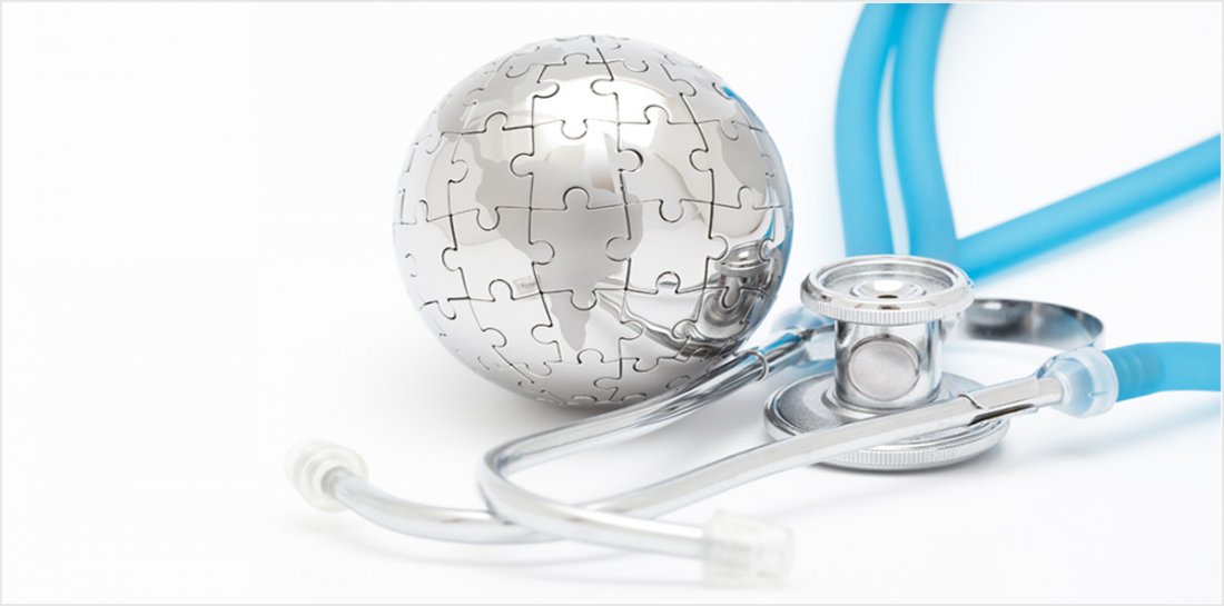 globe as a puzzle and stethoscope