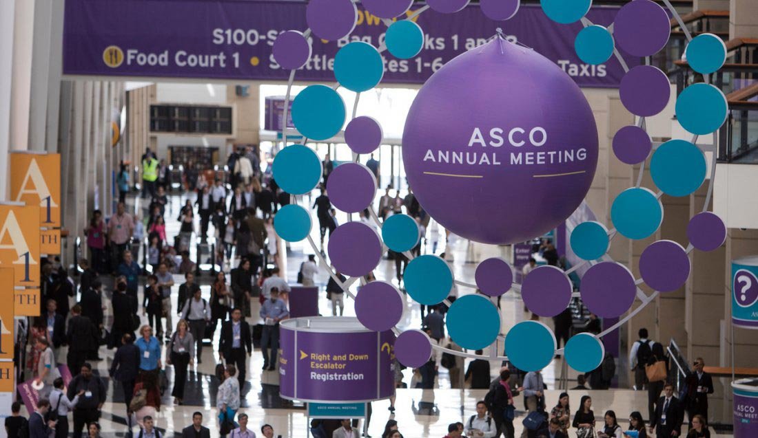 A crowded lobby of attendees at the ASCO annual meeting